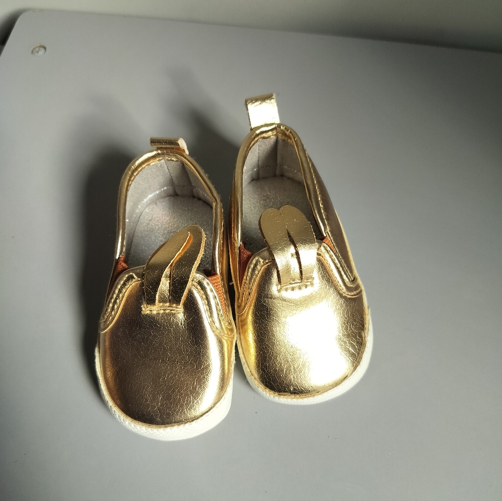 Rising star gold shoes